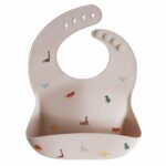 Mushie Silicone Bib (Dinosaurs) in Cyprus